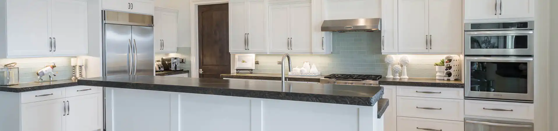 Photo of kitchen with custom white paint color